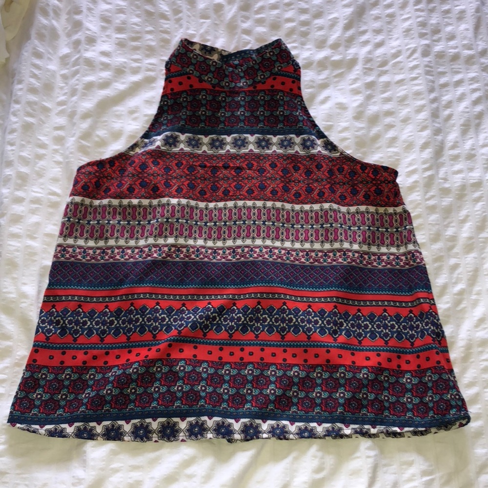 High neck top with intricate design
